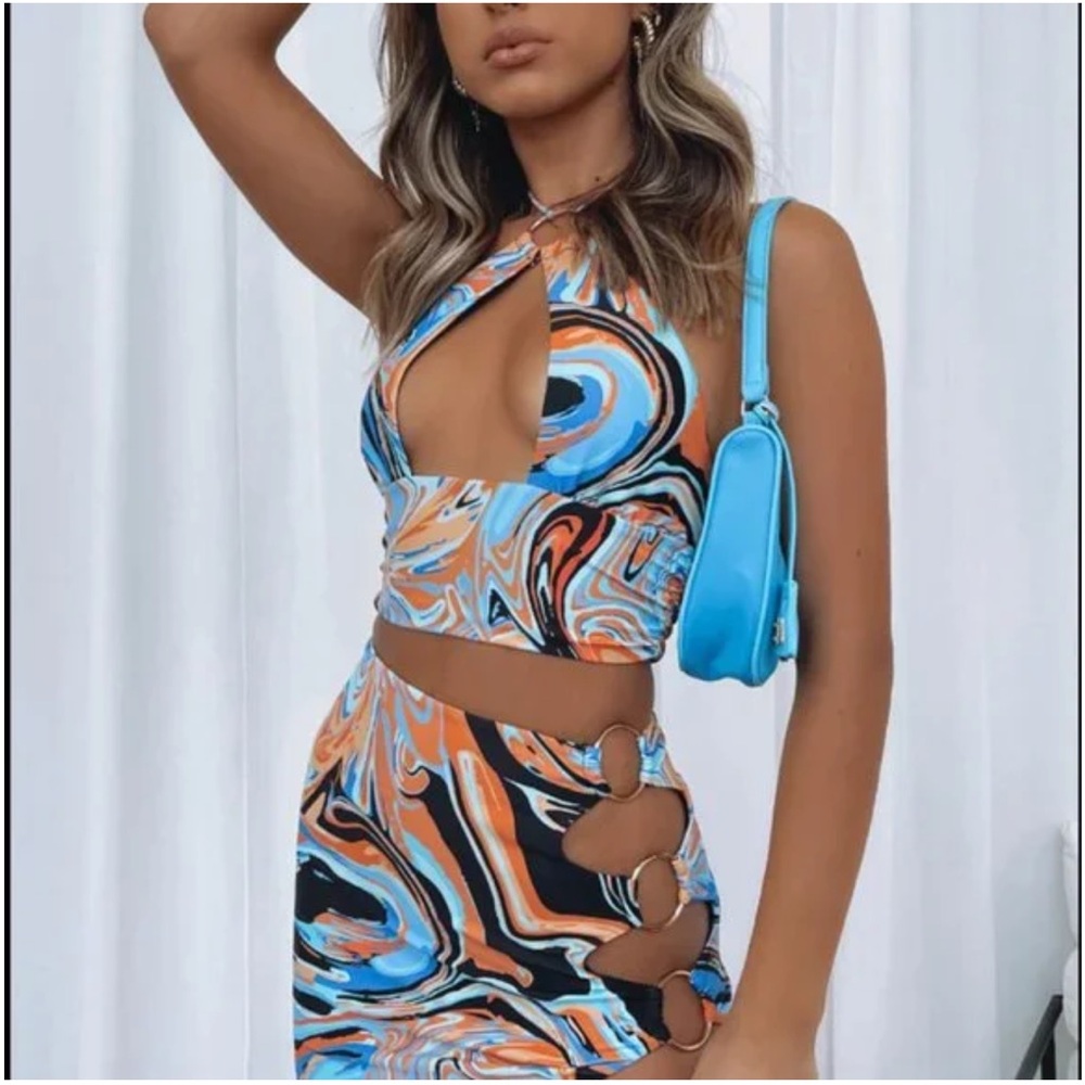 White Fox Boutique | Got Your Attention Mini Skirt & Top Orange Swirl set
